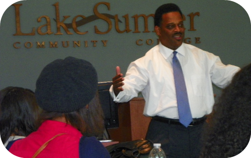 Bobby Lyons speaking to an audience